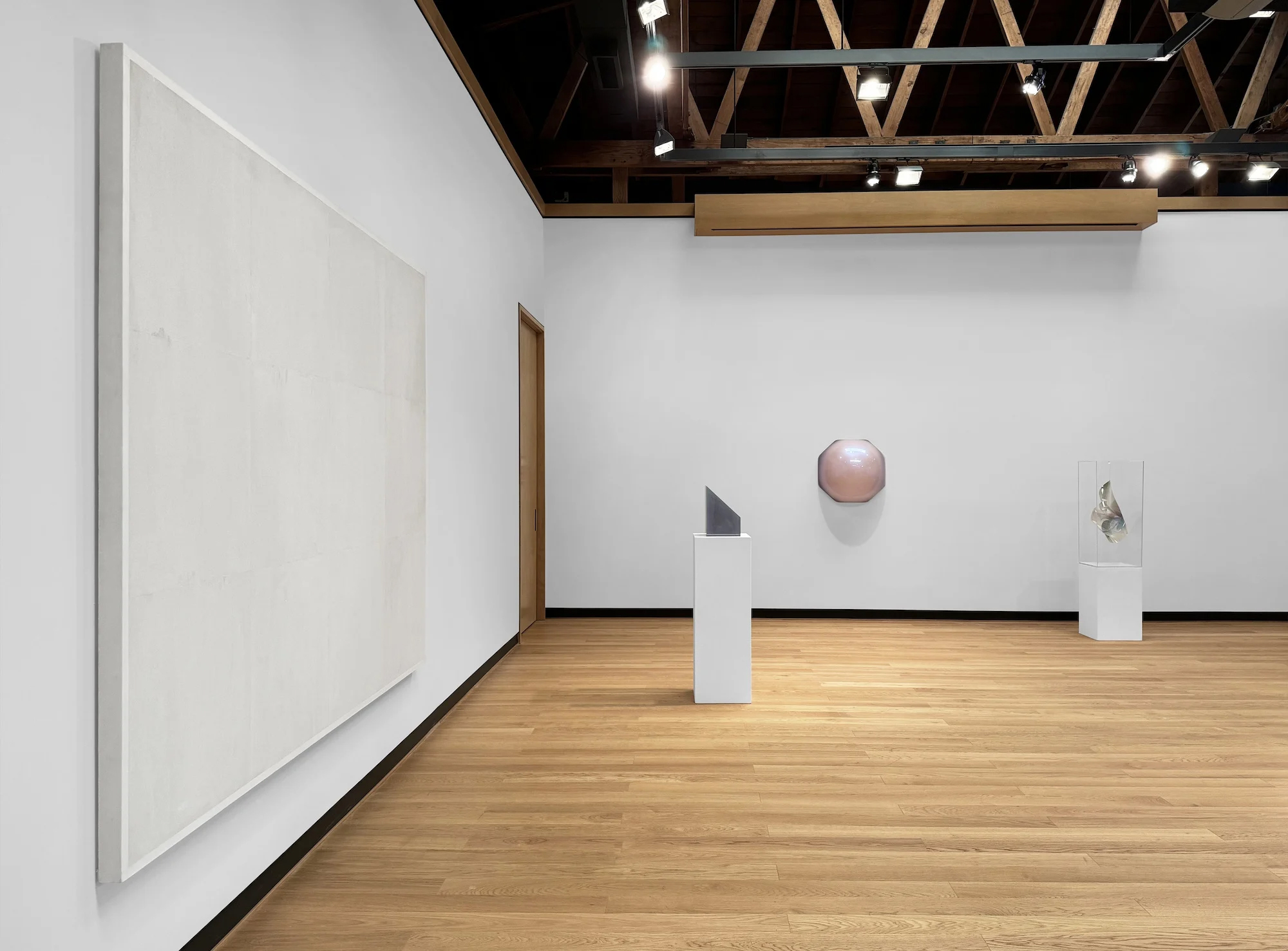 Installation photograph: Installation view of "Luminaries of Light: Pioneers of the California Light and Space Movement" curated by Genevieve Williams at The Honarkar Foundation for Arts & Culture in Laguna Beach. Courtesy The Honarkar Foundation for Arts & Culture.