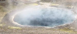 Emerald Pool, Yellowstone, ca. 1895 (OP.1311). Fig. 1. The Emerald Pool, Upper Geyser Basin, Yellowstone National Park, June 2022