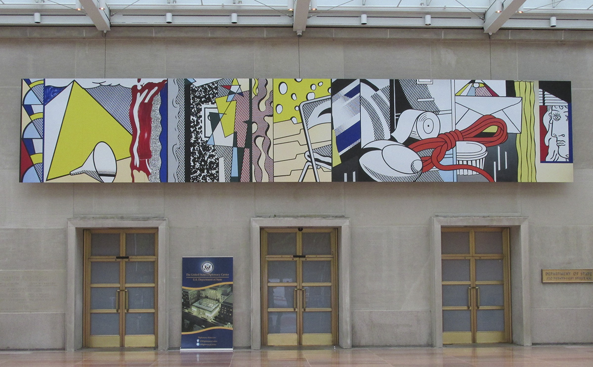From RLF Archives: In 2017, the Estate of Roy Lichtenstein gifted a painted replica of the artist's 1983 Greene Street Mural (RLCR 3211) to the Foundation for Art and Preservation in Embassies (FAPE). A smaller reproduction printed on board was installed at the new pavilion of the National Museum of American Diplomacy, Washington D.C., on the occasion of the event to announce this gift. Dimensions: 96 x 512 in. (244 x 1300 cm).
Photo: Courtesy of the Foundation for Art and Preservation in Embassies